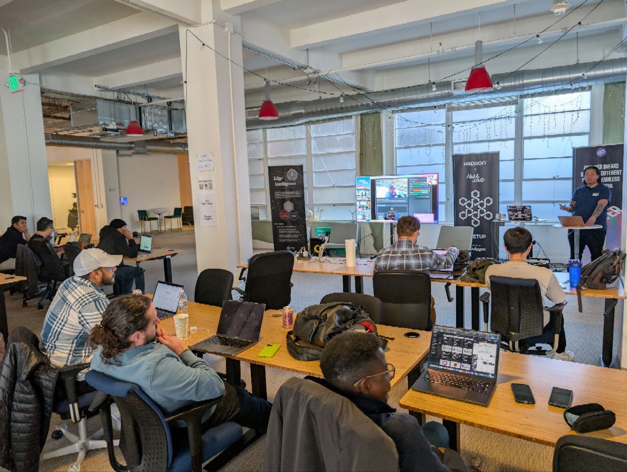 RJ leading an AI workshop with a room full of builders